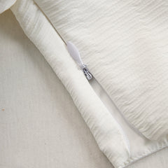 Cream textured lantern sleeve two-piece pants set for women featuring stylish lantern sleeves and a comfortable fit.