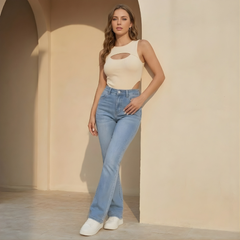 Women’s high waist slim fit bootcut jeans made from cotton denim, displayed on a hanger against a white background.
