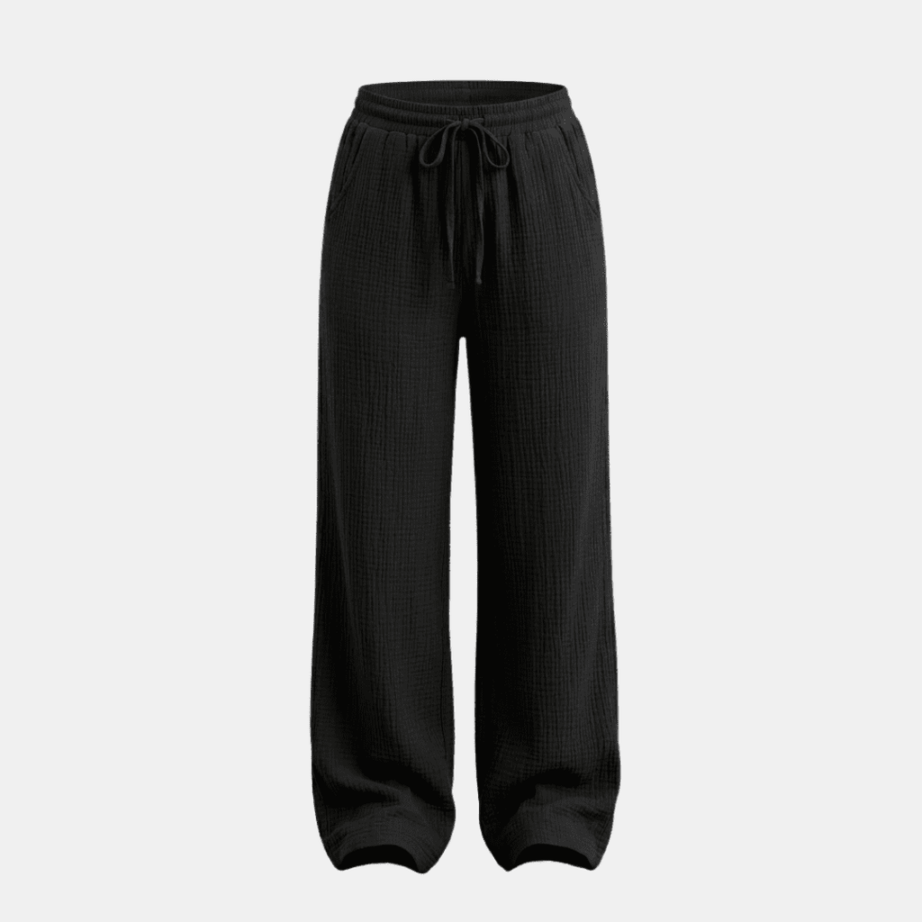 Women’s cotton wide-leg trousers by Tammy Bradley, showing relaxed fit and lightweight fabric in a neutral color.