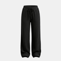 Women’s cotton wide-leg trousers by Tammy Bradley, showing relaxed fit and lightweight fabric in a neutral color.