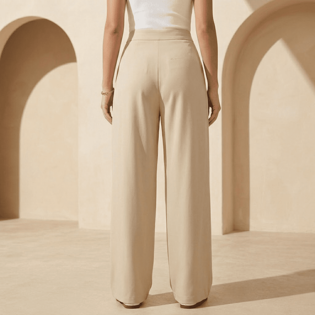 Women's high-waisted wide-leg tailored trousers by Tammy Bradley, featuring a smooth fabric and classic fit.