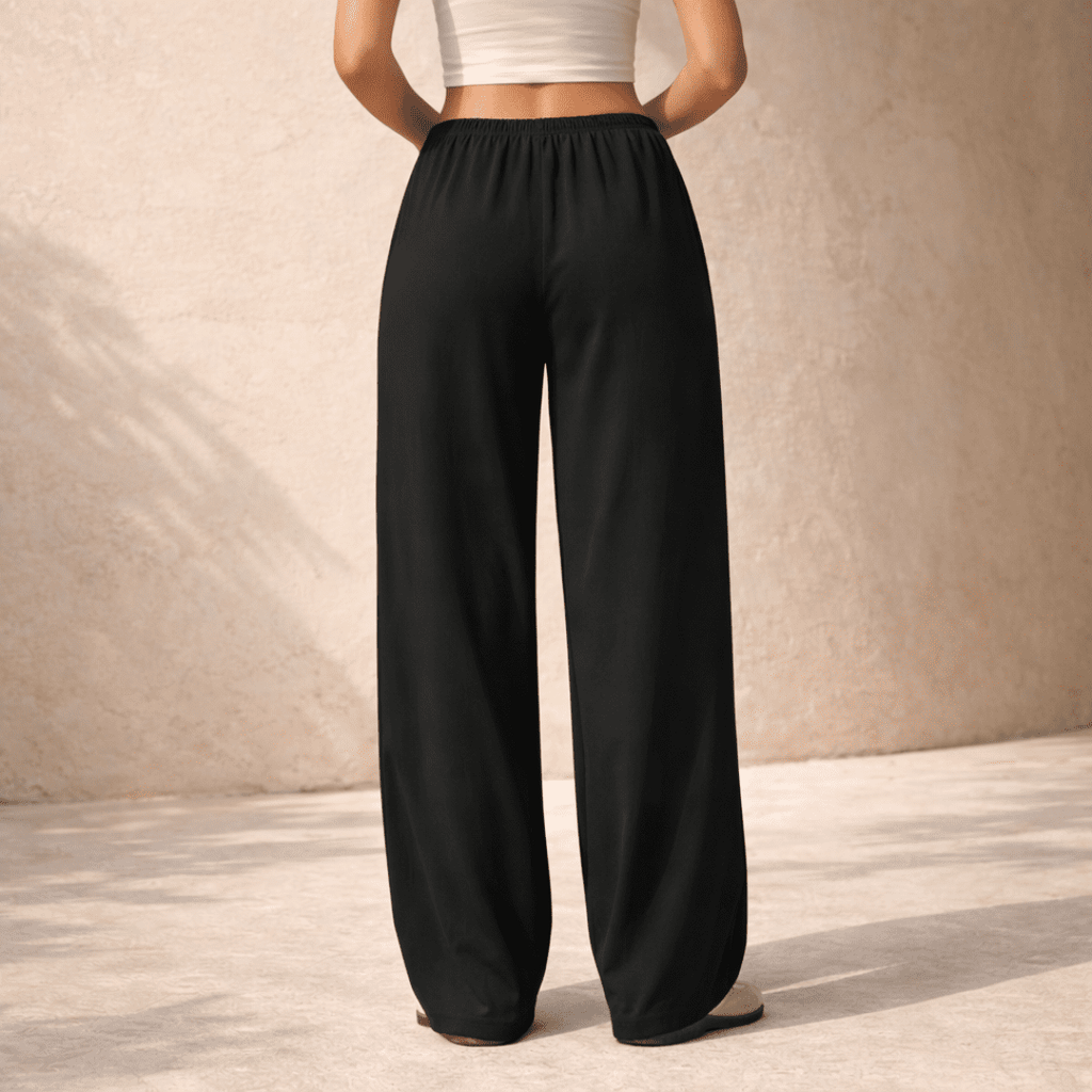 Women's wide-leg drawstring lounge trousers by Tammy Bradley, featuring a relaxed fit and comfortable fabric.