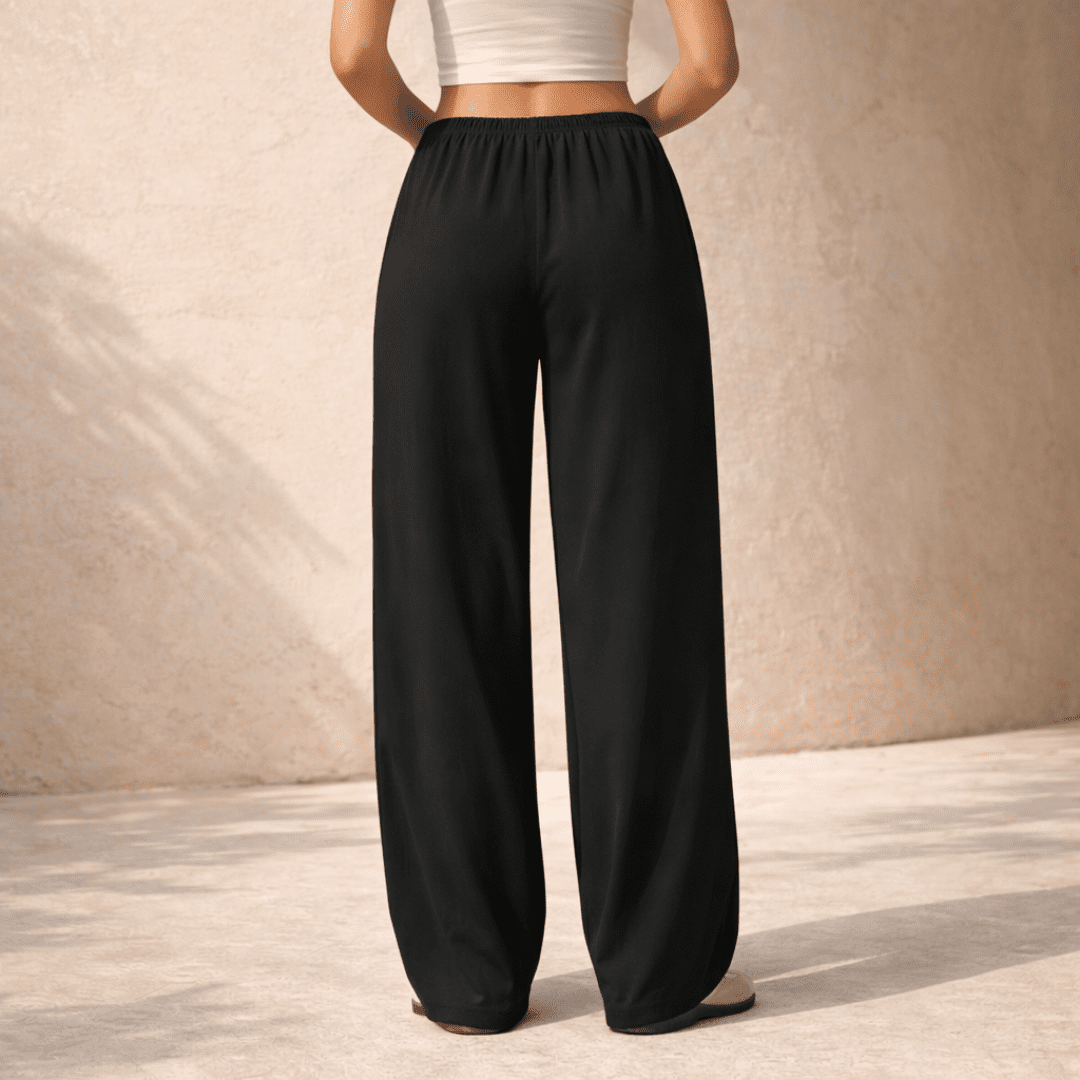 Women's wide-leg drawstring lounge trousers by Tammy Bradley, featuring a relaxed fit and comfortable fabric.