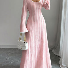 White A-line bodycon ribbed knit maxi dress with split-joint square neckline, stylish and form-fitting for elegant occasions.
