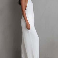 White pleated halter neck wide-leg resort jumpsuit for women, featuring stylish pants from My Store.