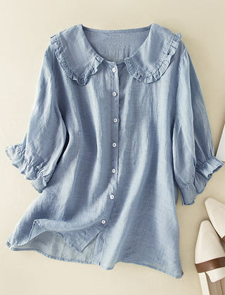 Light blue ruffle linen summer dress for women, featuring a flowing design and sleeveless style, perfect for warm weather.