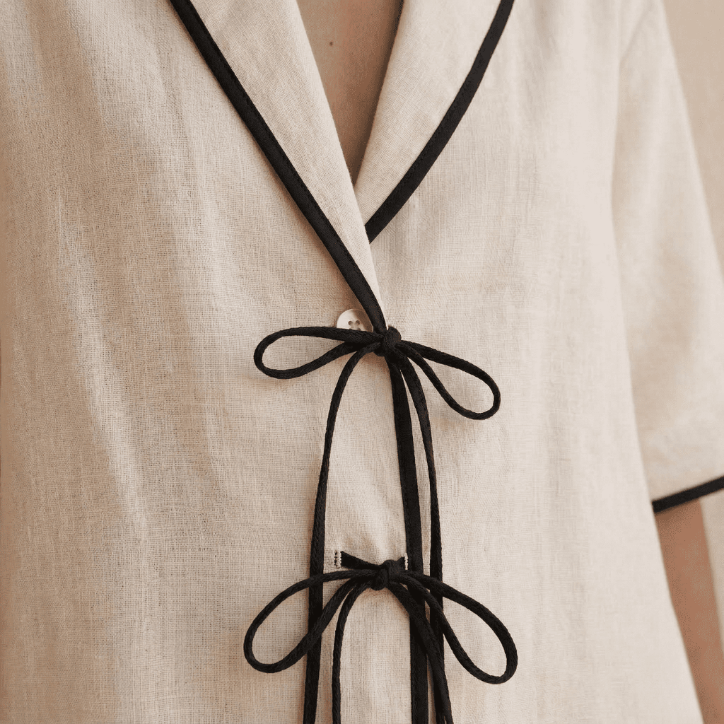 Ivory linen-blend shirt and skirt co-ord set for women by Tammy Bradley, featuring a matching top and midi skirt in lightweight fabric.