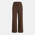 Women's cable-knit wide-leg lounge trousers by Tammy Bradley, showing cozy knit fabric and relaxed fit in neutral color.