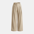 Women's high-waisted wide-leg tailored trousers by Tammy Bradley, shown in a neutral fabric with a structured fit.