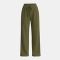 Women's plissé wide-leg trousers by Tammy Bradley, featuring flowing fabric and a relaxed fit, shown in a stylish pants silhouette.