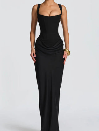 Summer maxi dress for women with square neckline and bodycon fit, stylishly displayed on a model in a summery setting.