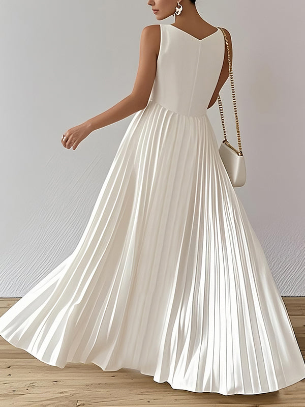 White A-line maxi dress with loose pleats and V-neck from My Store, featuring a solid color design and flowing silhouette.