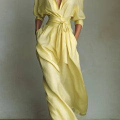 Solid color lapel long sleeve casual maxi dress with pockets and waist-cinching design, perfect for everyday wear.