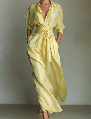 Solid color lapel long sleeve casual maxi dress with pockets and waist-cinching design, perfect for everyday wear.