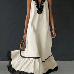 A-line maxi dress with contrast colors, pleated ruffle trim, split joint, and V-neck design, featuring a loose fit and elegant style.