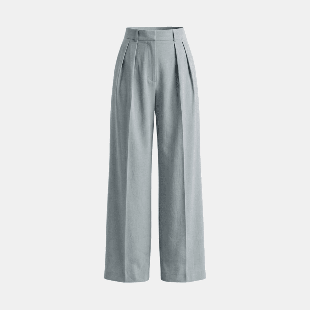 White high-waisted pleated wide-leg trousers for women by Tammy Bradley, shown on a model, with a relaxed fit and flowing fabric.