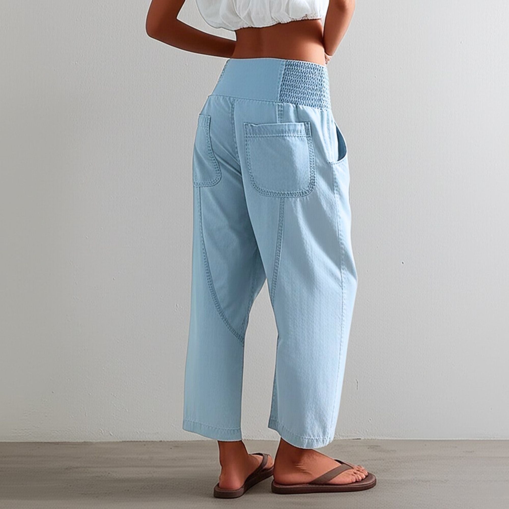 Women’s harem-cut wide-leg denim trousers with a loose pull-on design, featuring relaxed fit and stylish denim fabric.