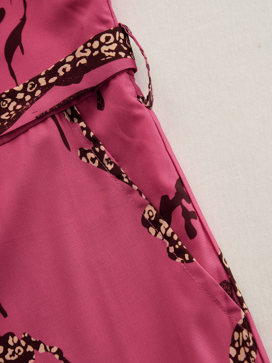 Rose red leopard print chiffon long sleeve jumpsuit for women, featuring stylish pants and a flowing design.