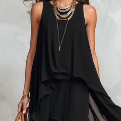 Black layered chiffon maxi dress with bohemian style, featuring flowing fabric and intricate detailing, perfect for elegant occasions.