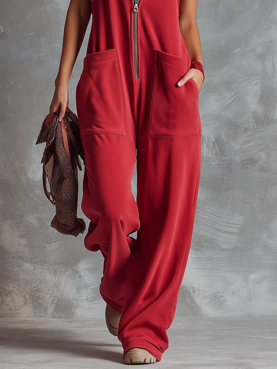 Raspberry red cotton hooded zip-front jumpsuit for women, featuring a comfortable fit and stylish design.