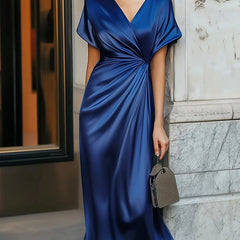 Loose short sleeve asymmetric solid color V-neck evening dress with split-joint design, stylish and elegant for formal occasions.