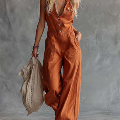 Rust orange cotton Western V-neck sleeveless jumpsuit for women, featuring stylish pants design and a comfortable fit.