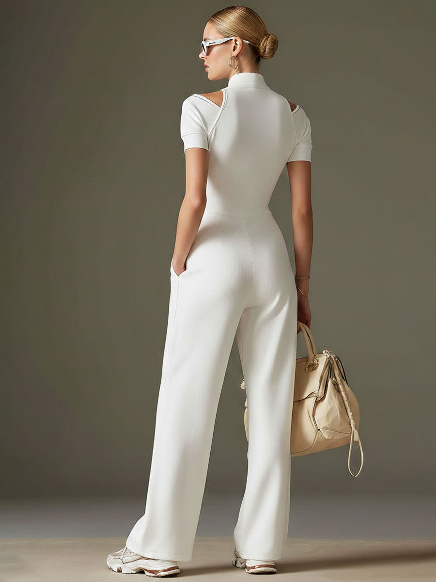 White cotton blend short sleeve wide-leg jumpsuit for women, featuring a relaxed fit and stylish design.