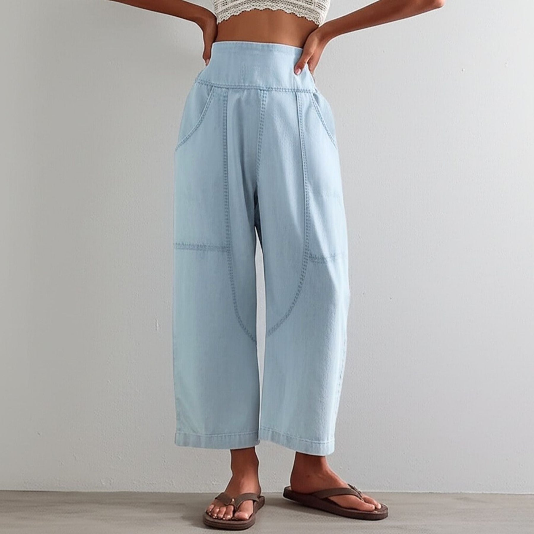 Women's pink harem-cut denim jeans by My Store featuring a sculpted design and relaxed fit, displayed on a model.