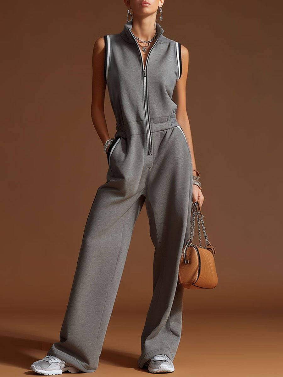 Dark grey cotton blend sleeveless jumpsuit with zip-up front, women's pants style, by My Store, shown on a model.