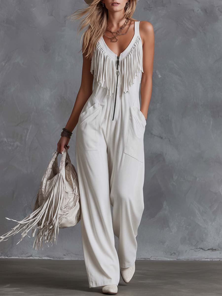White faux suede western fringe V-neck jumpsuit for women, featuring stylish fringe details and a V-neck design.