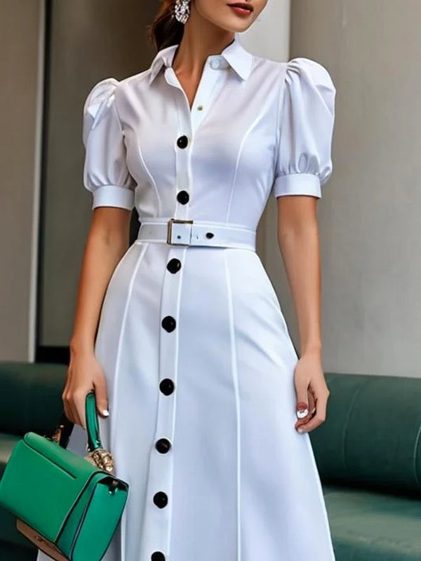 White maxi dress with puff short sleeves, belted waist, button details, and lapel collar from My Store.