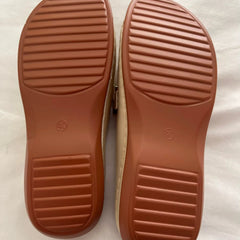 Comfortable women's orthopedic wedge sandals with supportive straps and cushioned soles, designed for stylish everyday wear.
