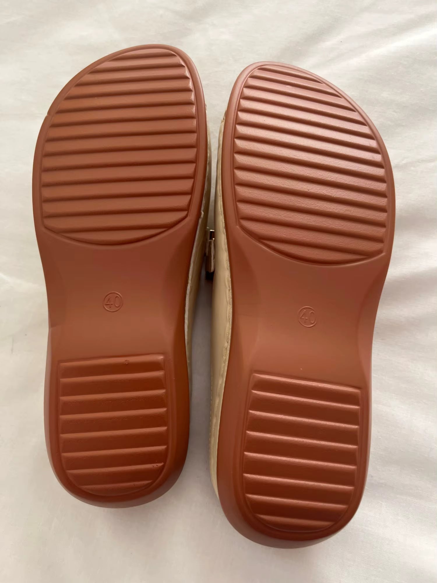 Comfortable women's orthopedic wedge sandals with supportive straps and cushioned soles, designed for stylish everyday wear.