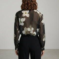 Floral long sleeve summer blouse for women, shown from the back, lightweight fabric with a relaxed fit.