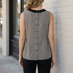 Gingham sleeveless summer blouse for women, shown from the back, stylish and lightweight top ideal for warm weather.