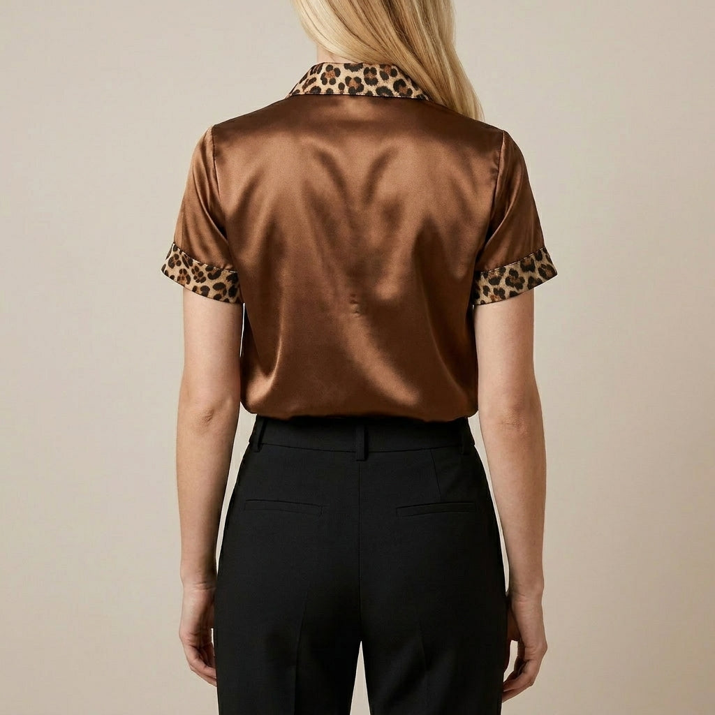 Leopard print summer blouse for women with short sleeves, shown from the back, stylish and lightweight women’s top.