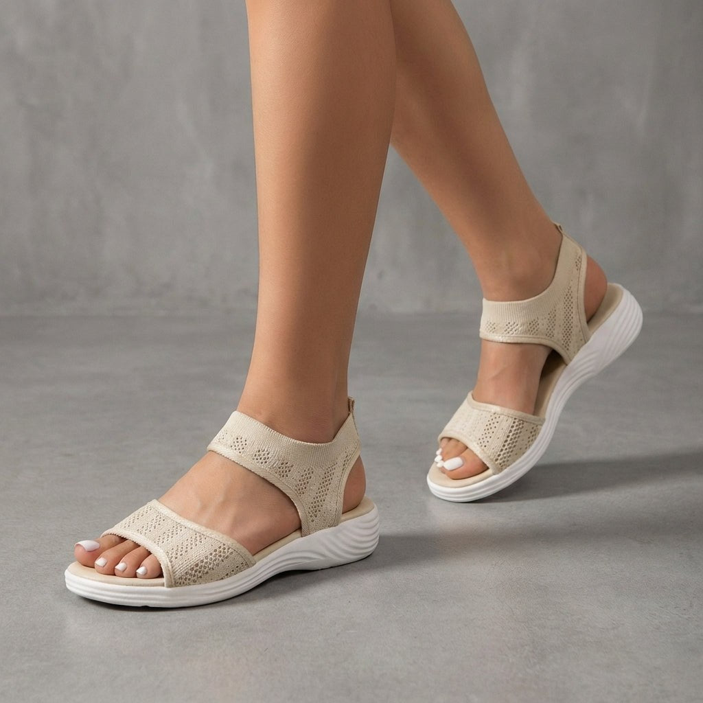 Beige knit ankle-strap sandals for women by Tammy Bradley, featuring open toes and stylish ankle straps.