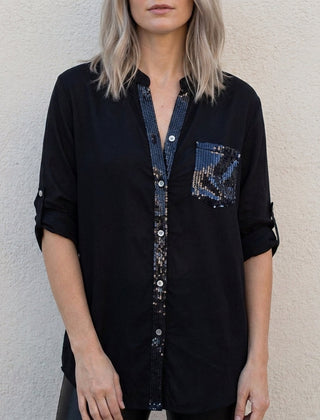 Black women's summer blouse with V-neck and button front, denim style, stylish top for warm weather.