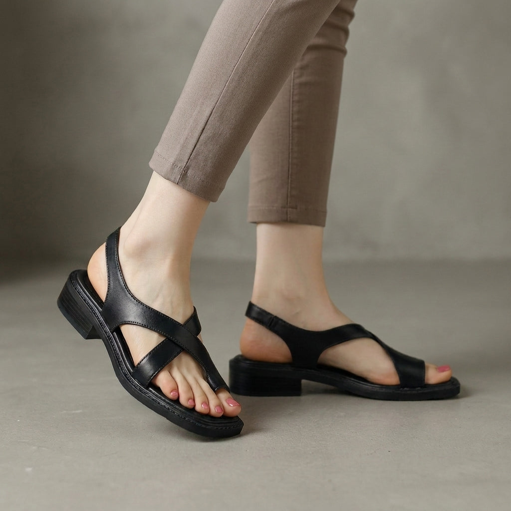 Black Tammy Bradley square-toe block-heel criss-cross sandals for women, showcasing stylish design with comfortable straps.