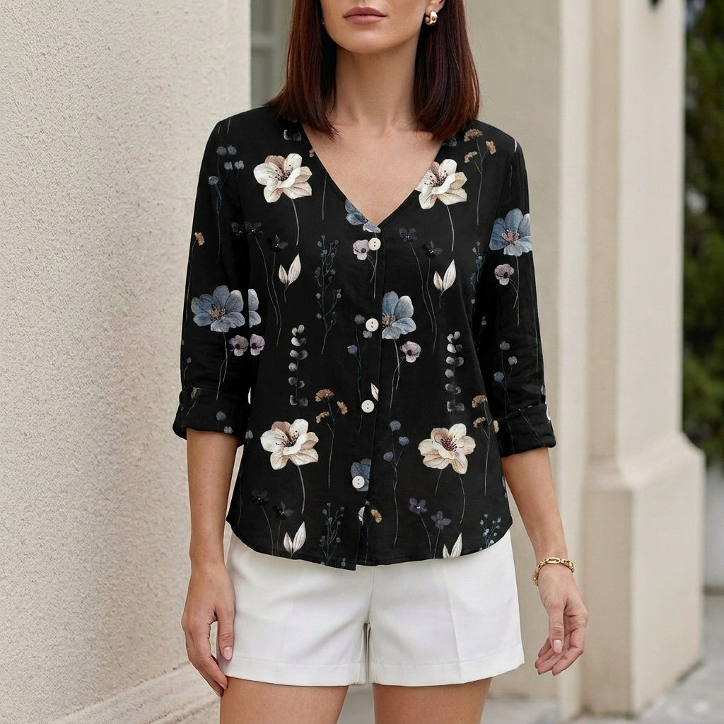 Black women's summer blouse with floral pattern, V-neck, denim fabric, and button front, perfect for casual warm-weather wear.