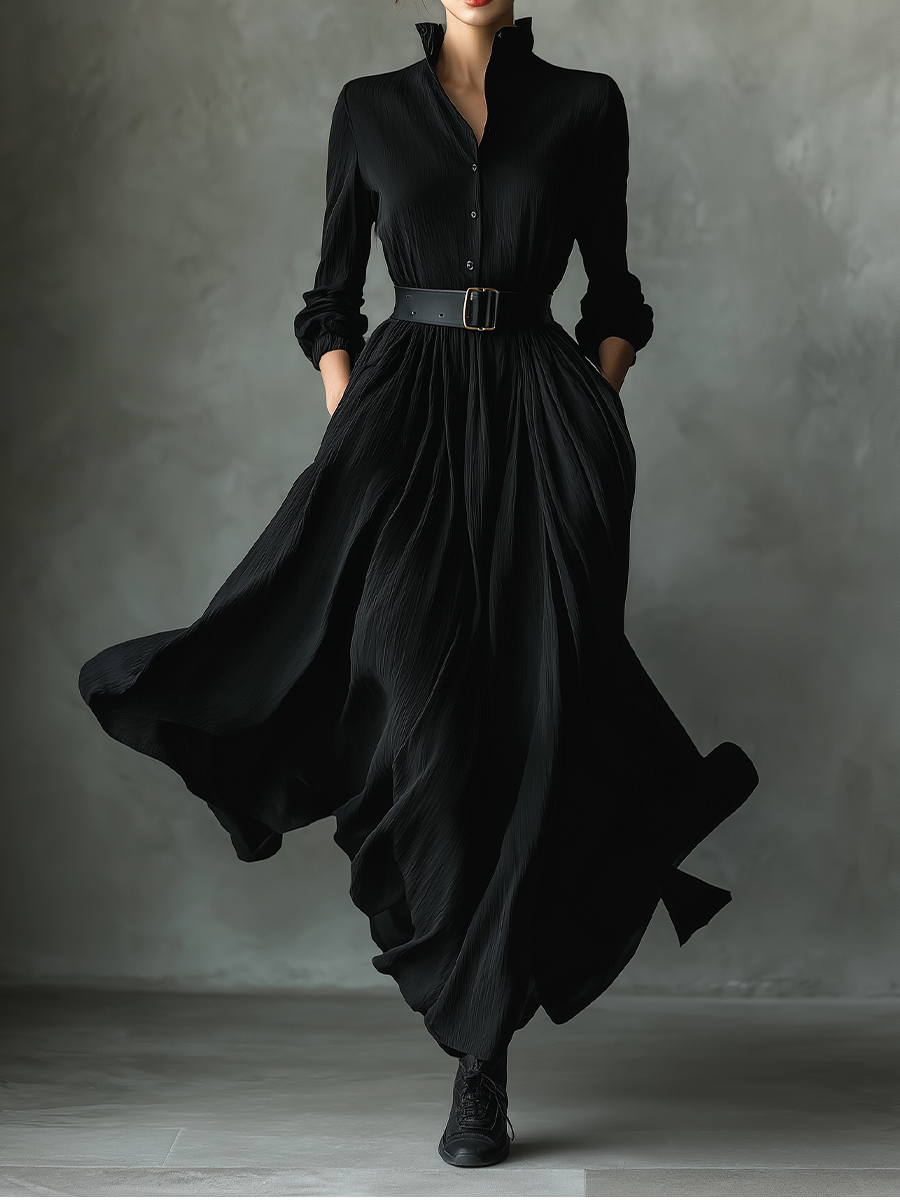 Black pleated maxi dress for women with flowing fabric and a flattering fit, featuring a sleeveless design and elegant style.
