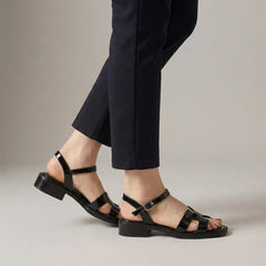 Black ankle-length flat sandals with ankle strap and buckle, stylish and comfortable footwear from My Store.