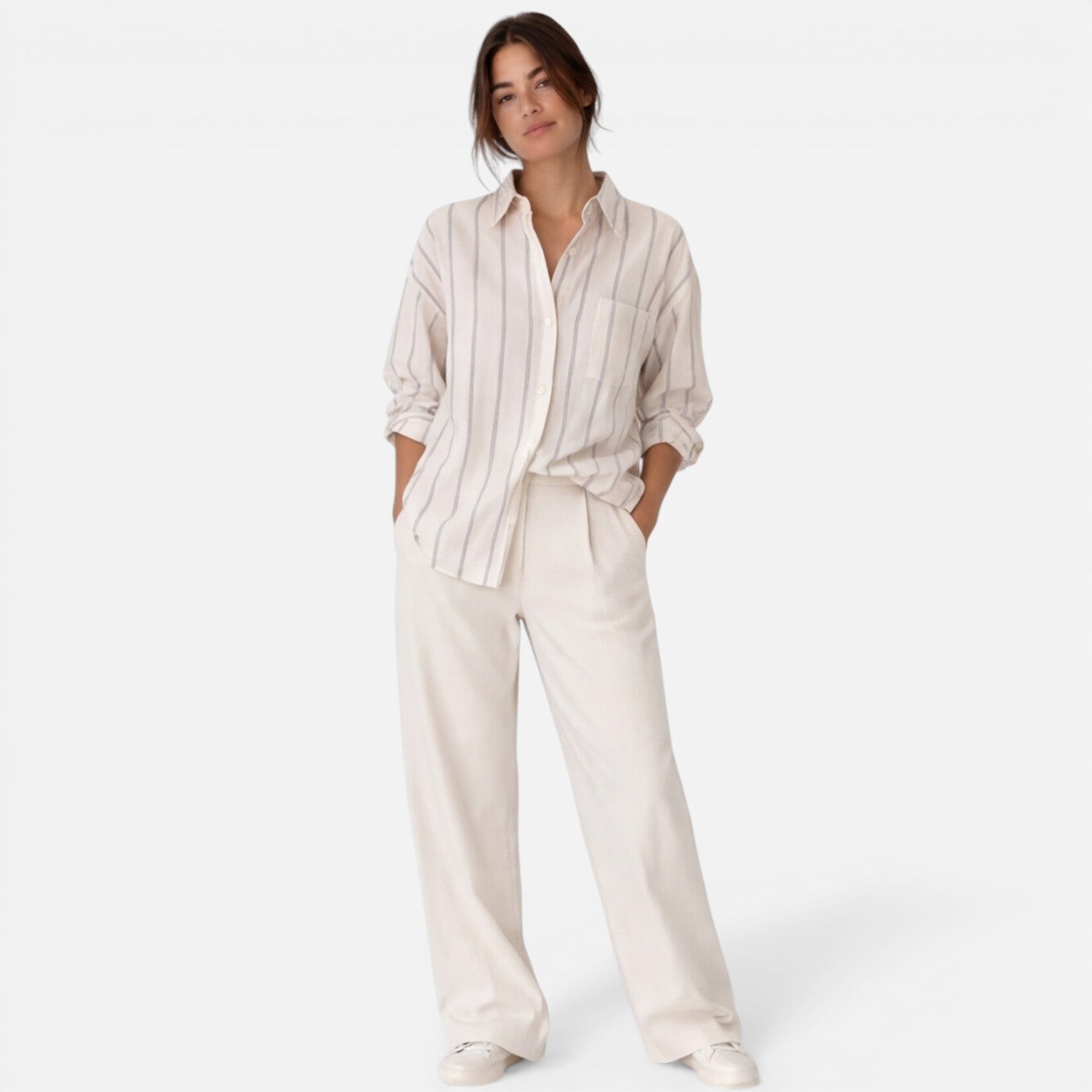 Women's relaxed fit striped button-down shirt with lightweight fabric, perfect for casual or office wear.