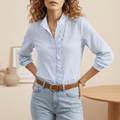 Blue linen ruffle-trim blouse for women by Tammy Bradley, featuring a stylish design and feminine ruffle details.