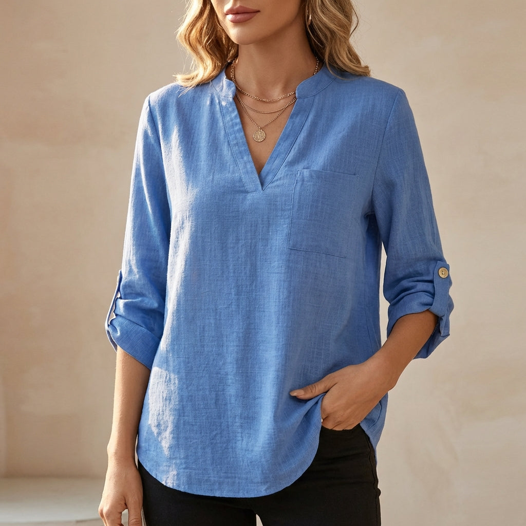 Blue women's summer blouse with a V-neck and flowy linen fabric, stylish top for warm weather from My Store.