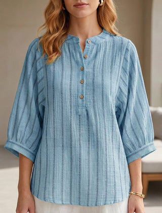 Blue striped linen summer blouse for women with button front, stylish and breathable top perfect for warm weather.