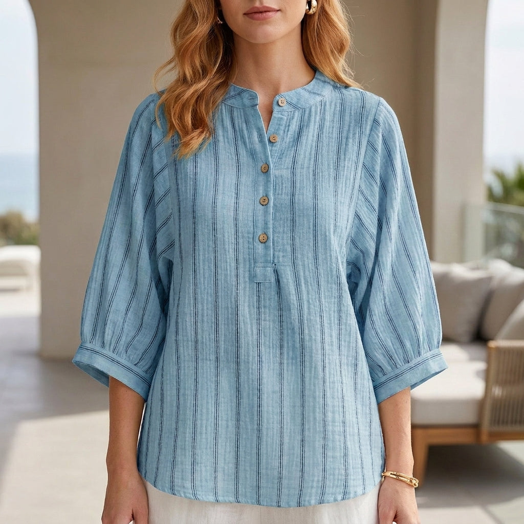 Blue striped linen summer blouse for women with button front, stylish and breathable top perfect for warm weather.