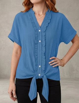 Blue V-neck denim summer blouse for women with ruffle details, casual style, perfect for warm weather.