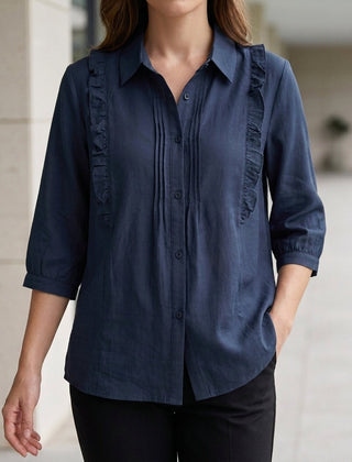 Blue denim summer blouse for women with ruffle details, stylish and lightweight top perfect for warm weather.