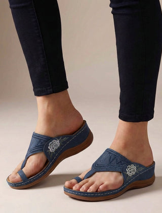 Blue orthopedic floral embroidered wedge sandals for women with supportive design and decorative flower details.